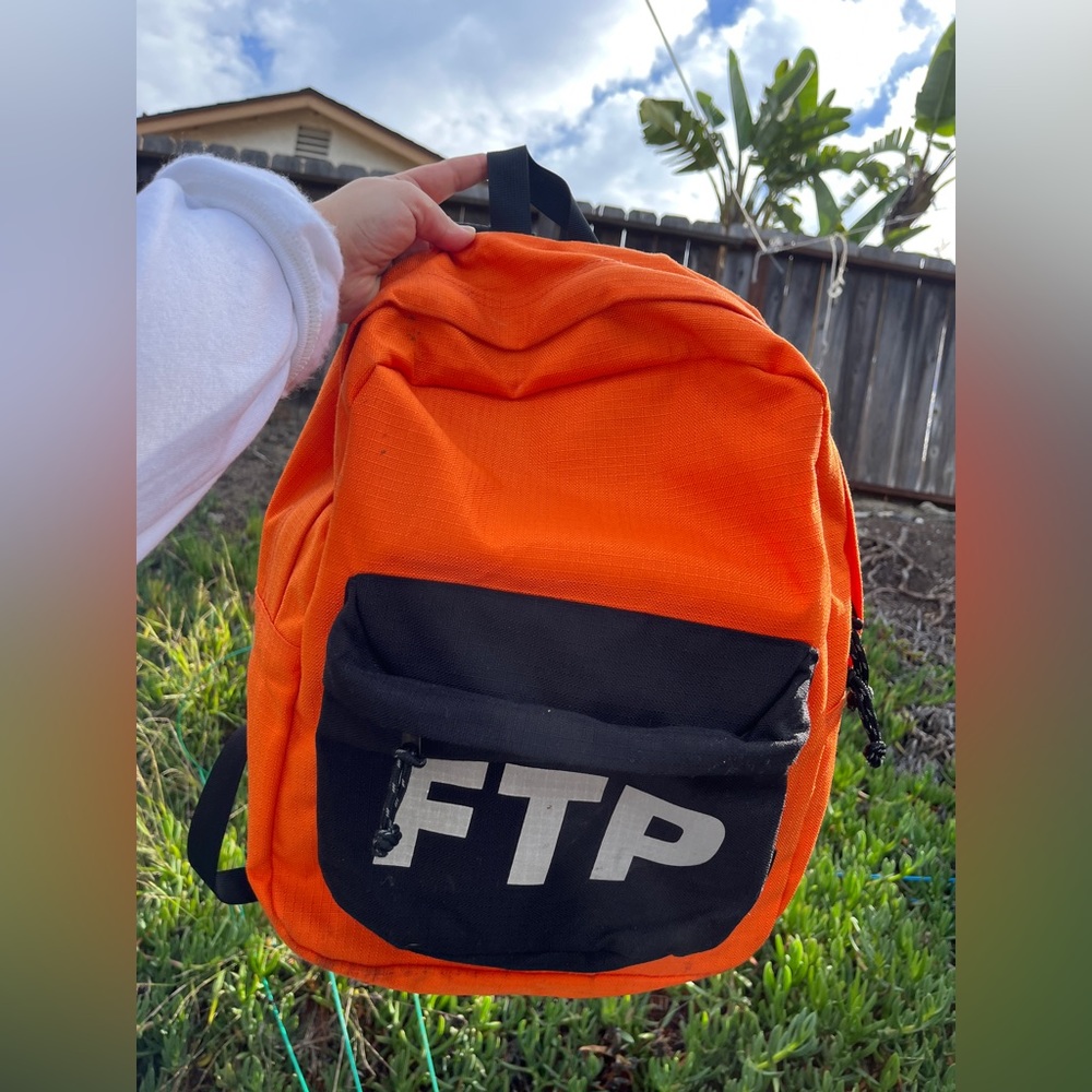 *SOLD* FTP - Reflective Logo Backpack in Orange